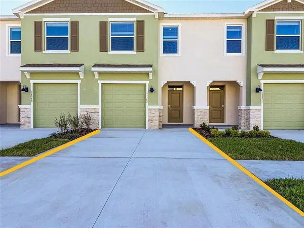 a view of a house with pool deck