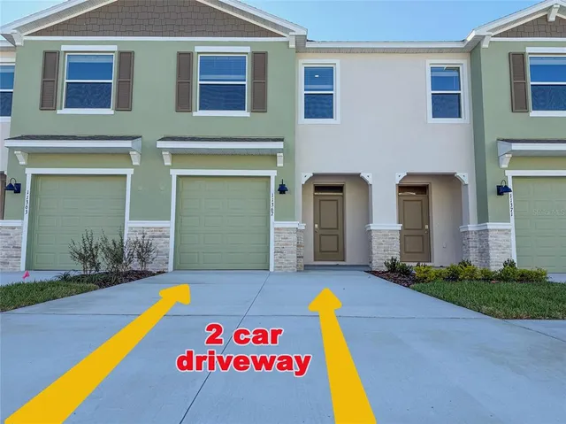 a view of a house with swimming pool