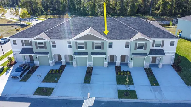 a view of a house with pool deck