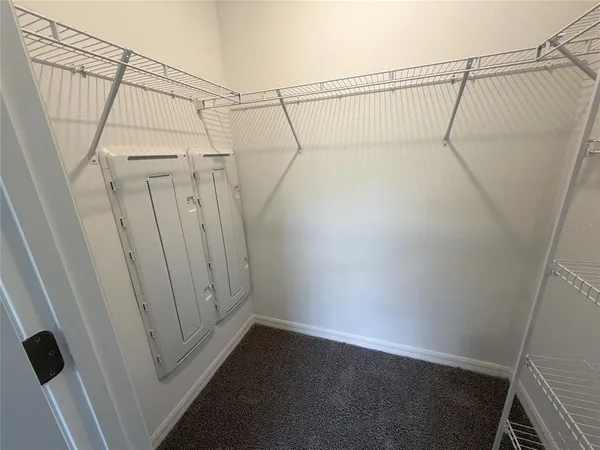 a bathroom with a toilet and shower