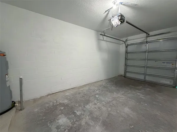 a aerial view of a house with a yard