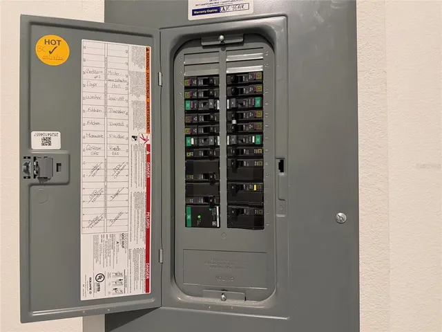 a aerial view of a house with a yard