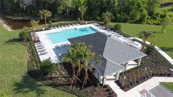 a view of yard with patio