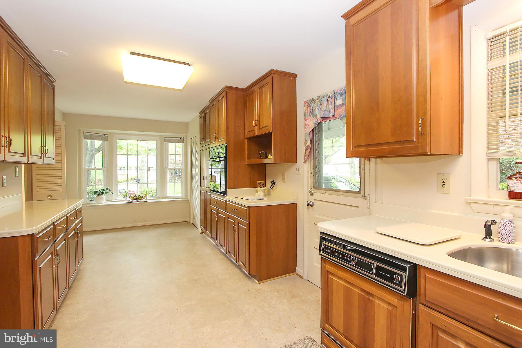 2609 Woodedge Road Silver Spring, MD 20906 - Photo 5 of 30 ENJOY 48" LIGHT CHERRY CABINETS