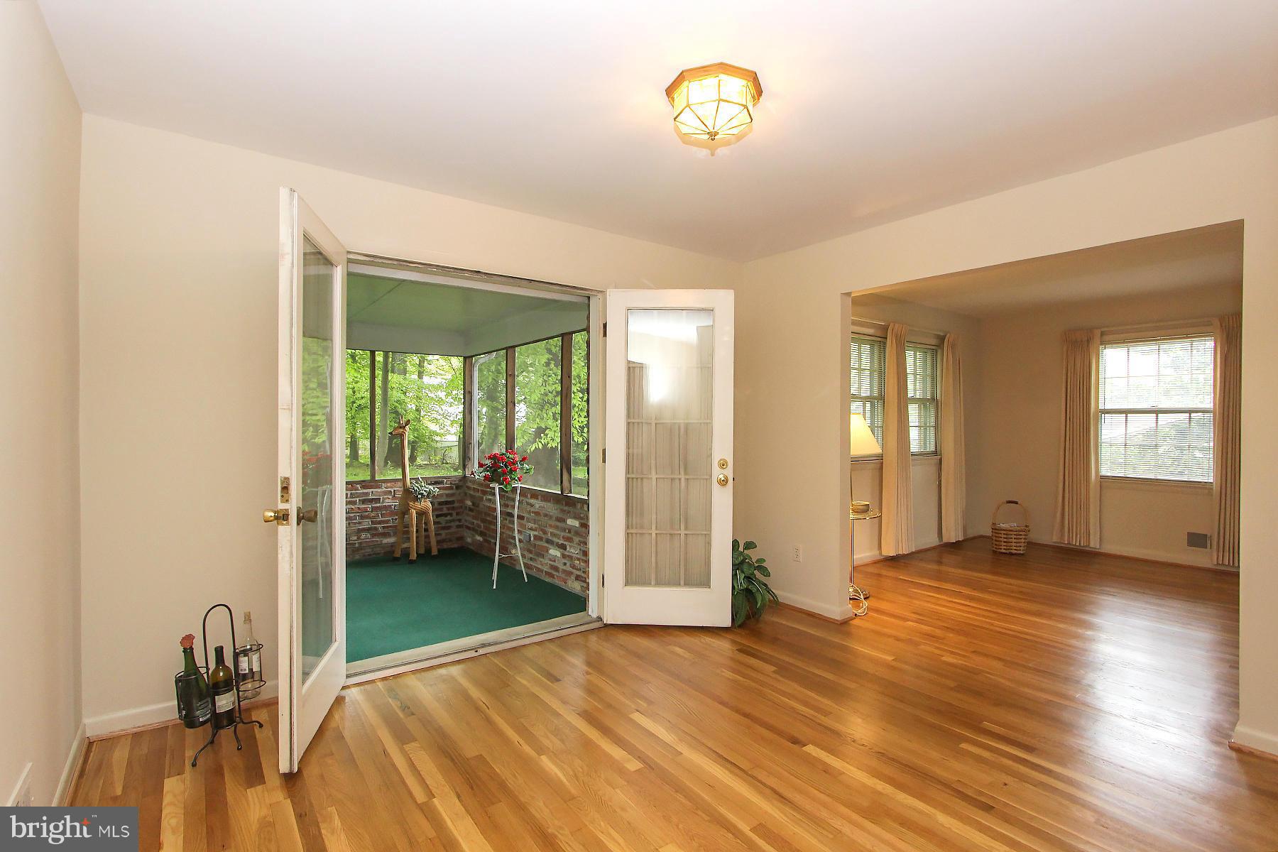 2609 Woodedge Road Silver Spring, MD 20906 - Photo 10 of 30 OPENS TO SPLENDID SCREENED PORCH