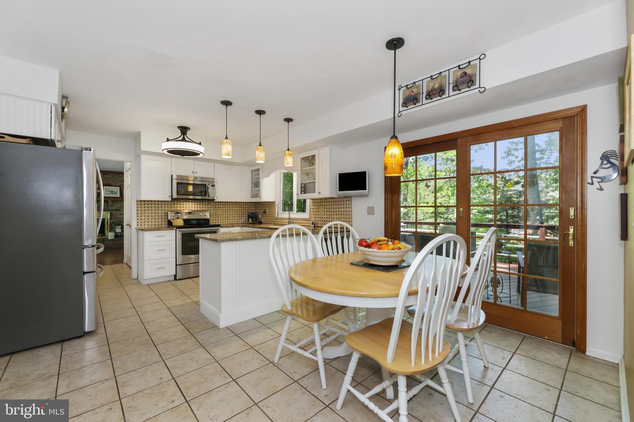 Renovated kitchen with eating area.