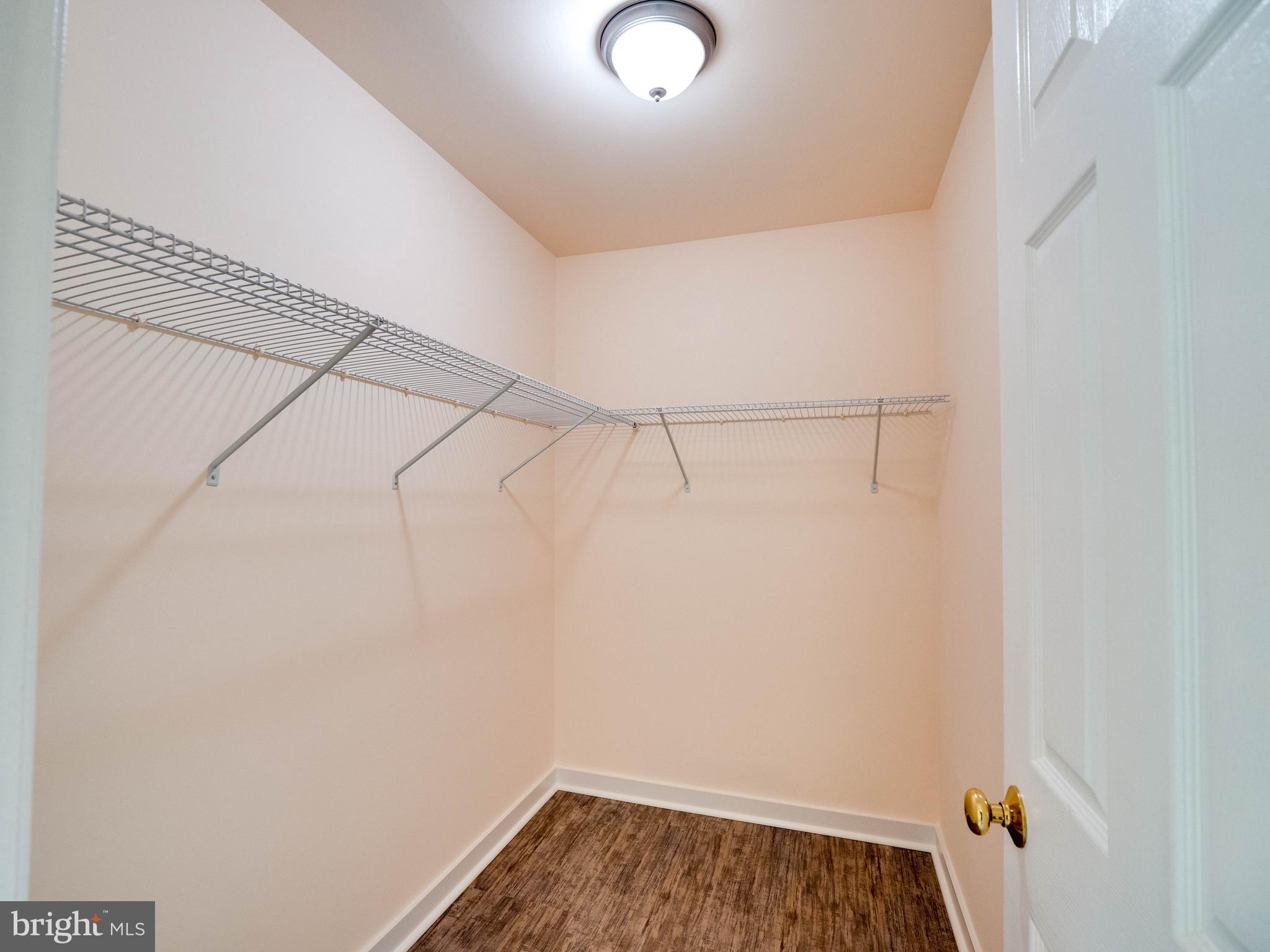 1049 Gardenview Loop, Unit 201 Woodbridge, VA 22191 - Photo 17 of 23 Walk-in Closet in Bedroom 1
