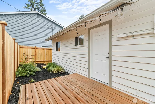 a view of backyard with potted plants