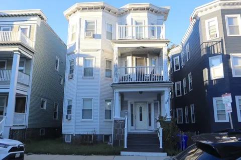 a front view of a multi story residential apartment building