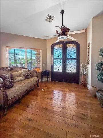 a living room with furniture and a window