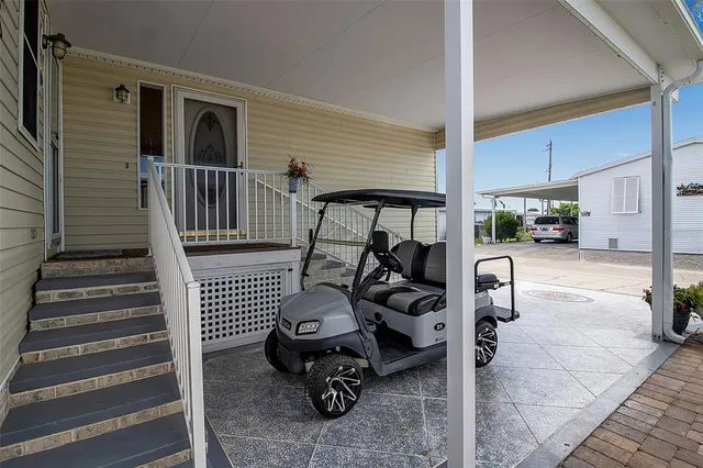a kitchen with stainless steel appliances granite countertop a stove and a microwave