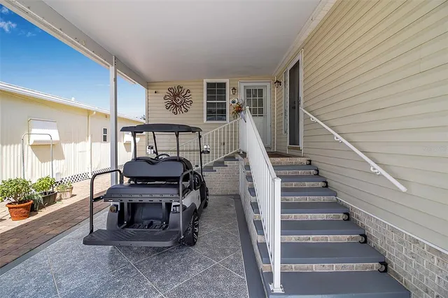 a kitchen with a sink cabinets and window
