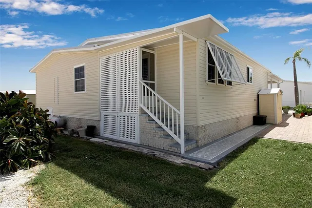 a kitchen with stainless steel appliances granite countertop a sink and stove