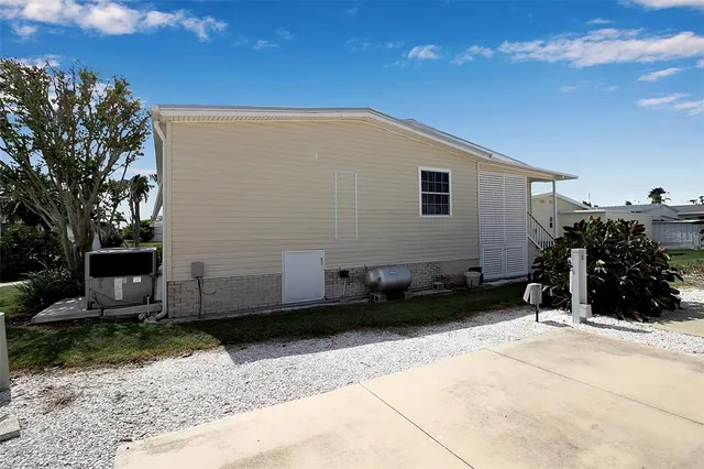 a kitchen with stainless steel appliances a sink stove and cabinets