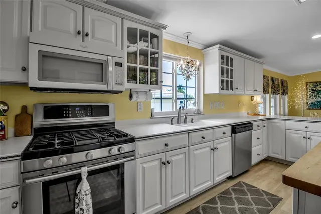a utility room with lots of clutter and bicycles