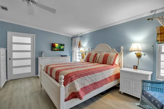 an aerial view of a house with a garden and trees