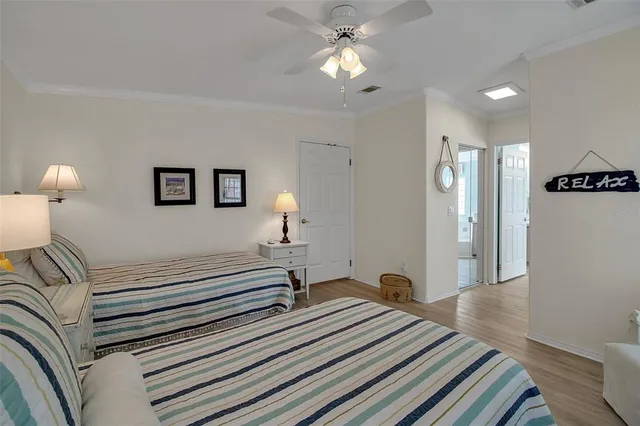 an aerial view of a house a garden and lake view