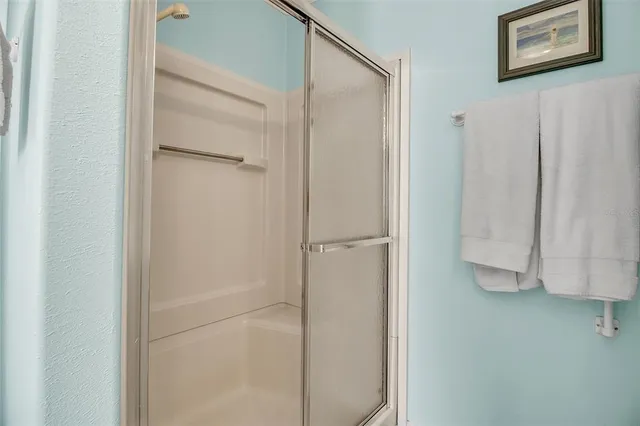 an aerial view of a house with outdoor space