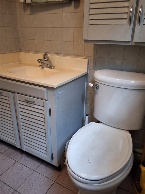 35 Pleasant Street Ware, MA 01082 - Photo 13 of 30 a bathroom with a toilet and a sink