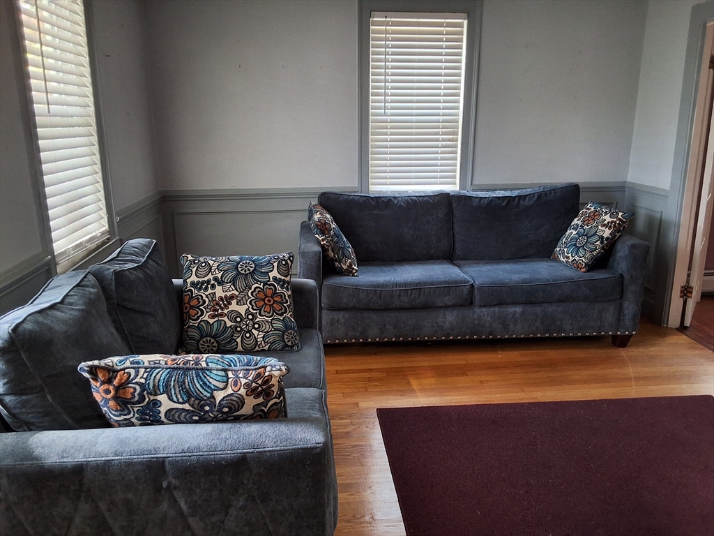 35 Pleasant Street Ware, MA 01082 - Photo 20 of 30 a living room with furniture and a couch