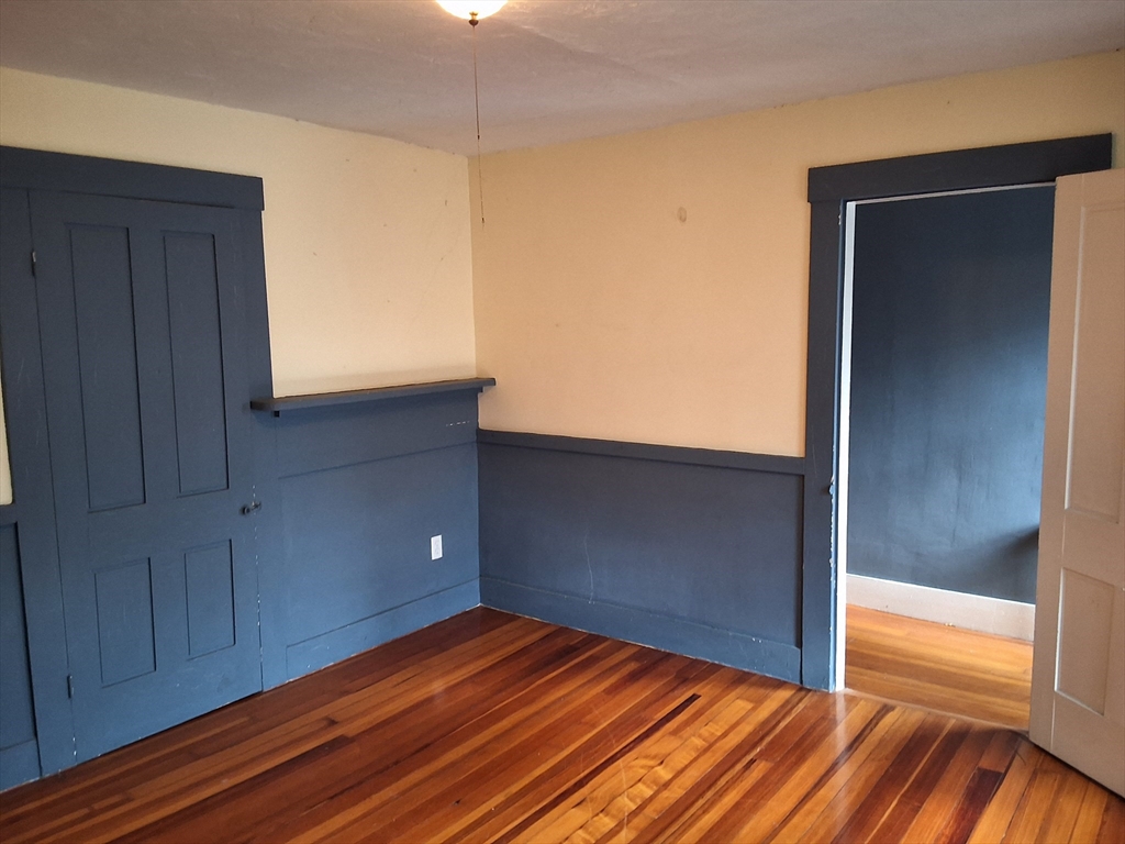 35 Pleasant Street Ware, MA 01082 - Photo 29 of 30 a view of empty room with wooden floor
