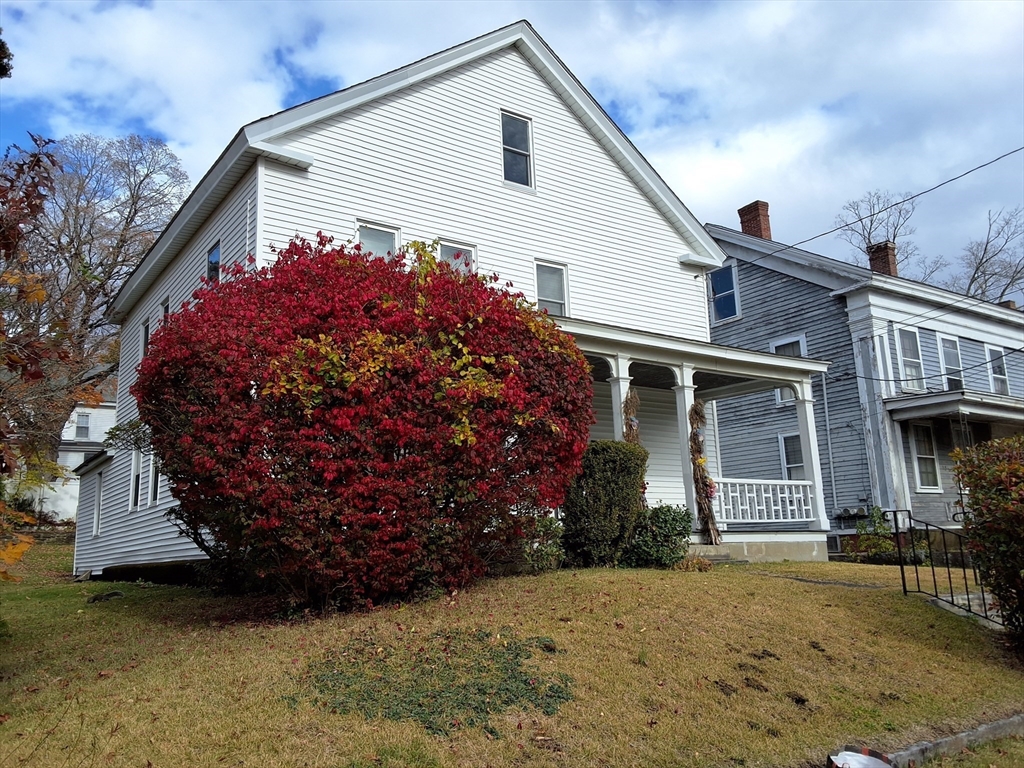 35 Pleasant Street Ware, MA 01082 - Photo 3 of 30 a front view of a house with a yard