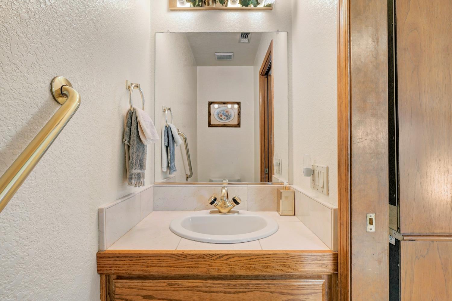 2952 Royce Drive Rescue, CA 95672 - Photo 42 of 70 half bath off the living room
