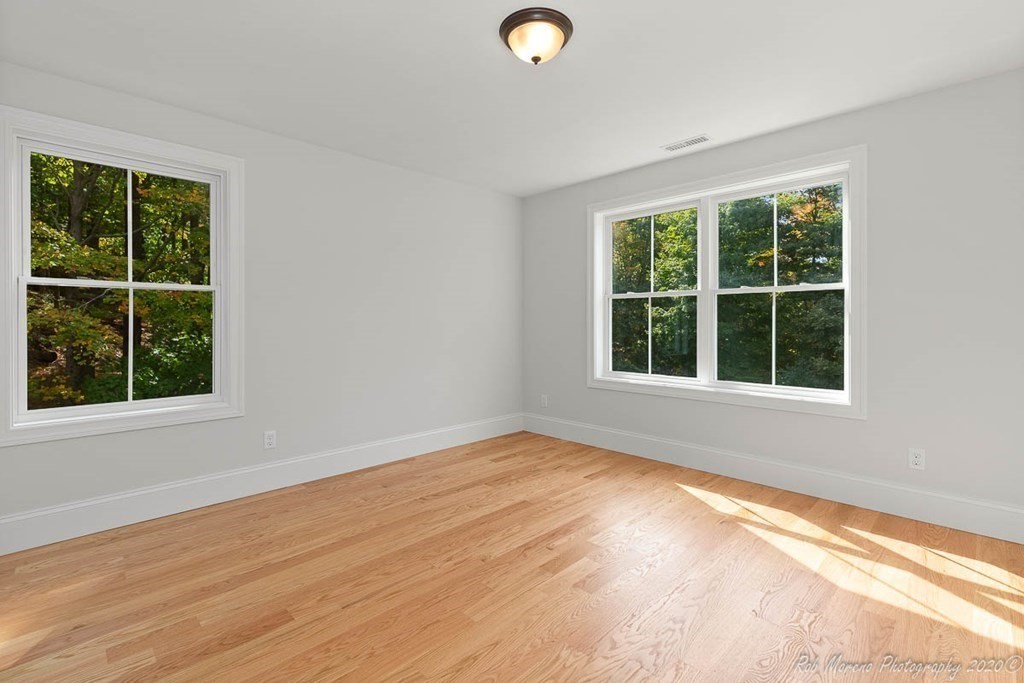 23 Ipswich Road Topsfield, MA 01983 - Photo 25 of 41 a view of an empty room with a window