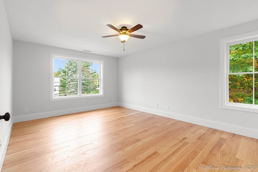 23 Ipswich Road Topsfield, MA 01983 - Photo 27 of 41 wooden floor in an empty room with a window
