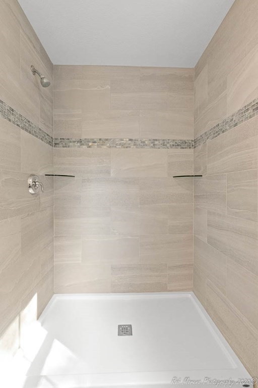 23 Ipswich Road Topsfield, MA 01983 - Photo 32 of 41 a bathroom with a shower and a bathtub