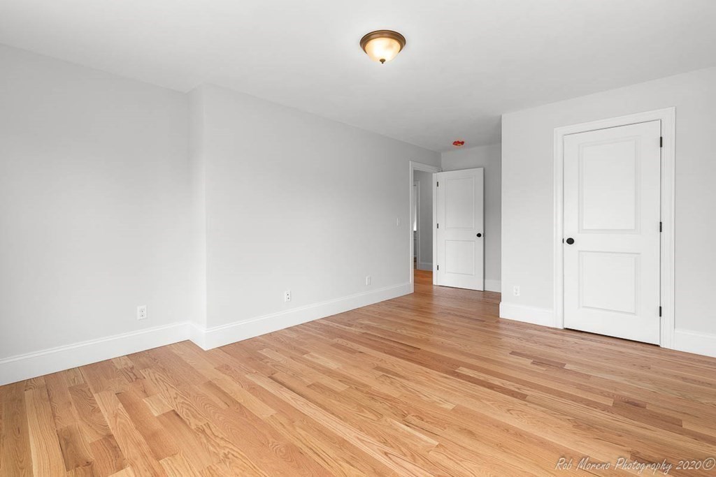 23 Ipswich Road Topsfield, MA 01983 - Photo 34 of 41 a view of empty room with wooden floor and fan