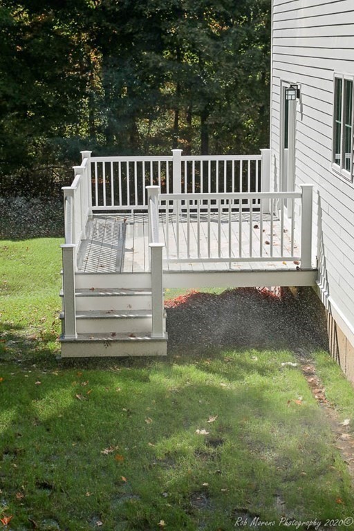 23 Ipswich Road Topsfield, MA 01983 - Photo 40 of 41 a view of a deck with a yard