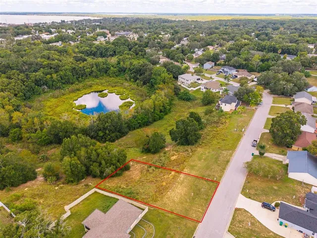a view of residential houses with outdoor space