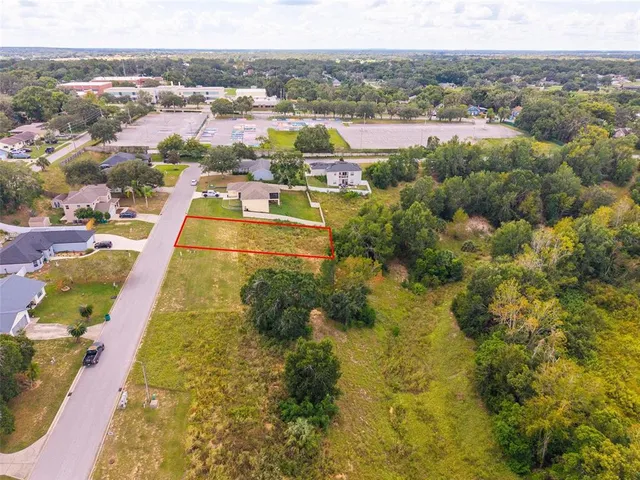 a view of swimming pool with outdoor seating