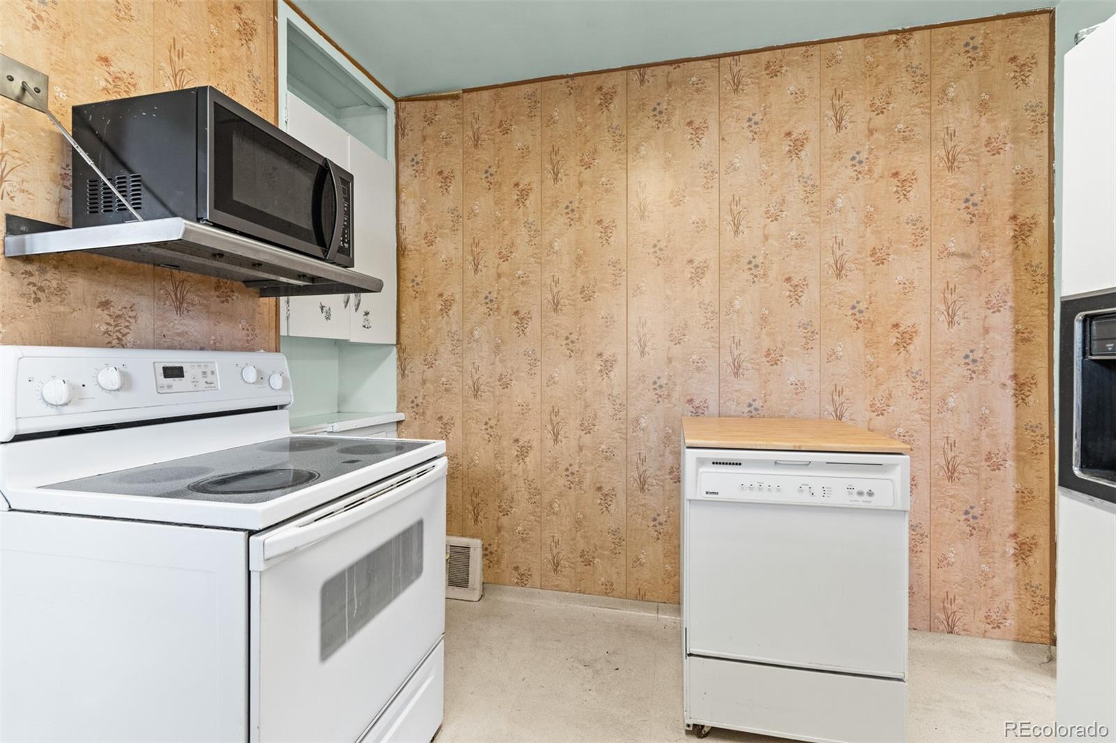 5919 South Bemis Street Littleton, CO 80120 - Photo 20 of 43 a utility room with dryer and washer