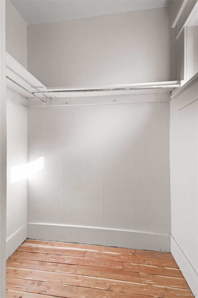 5919 South Bemis Street Littleton, CO 80120 - Photo 27 of 43 a view of an empty walk in closet