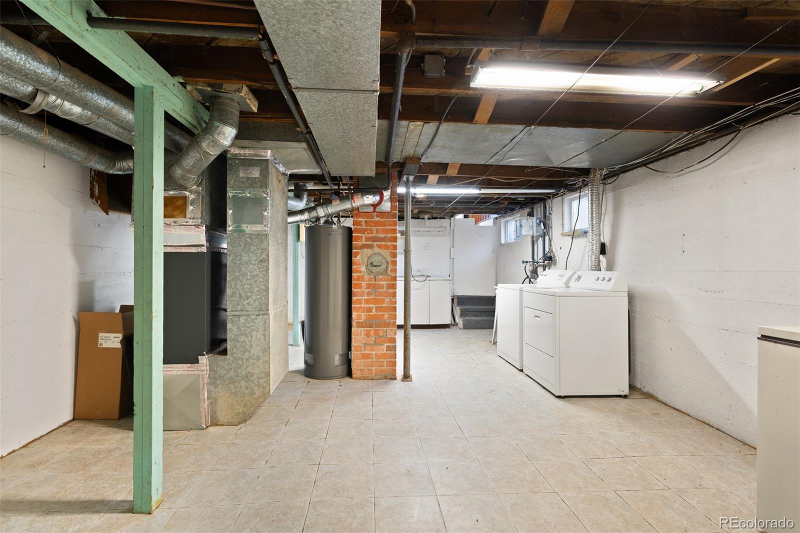 5919 South Bemis Street Littleton, CO 80120 - Photo 34 of 43 a view of a storage & utility room