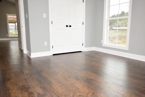 807 Clear Creek Road Pulaski, TN 38478 - Photo 10 of 19 an empty room with wooden floor and windows