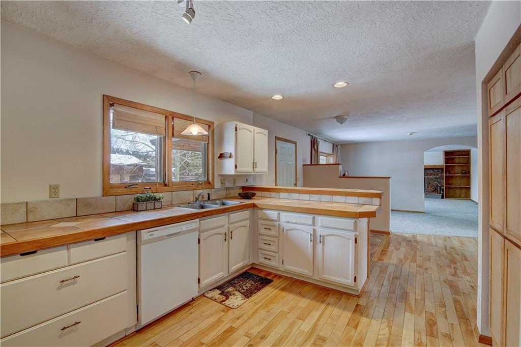371 Alpine Road Dillon, CO 80435 - Photo 1 of 34 a large kitchen with a sink and cabinets