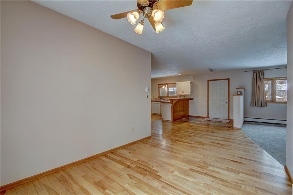 371 Alpine Road Dillon, CO 80435 - Photo 12 of 34 a view of empty room with wooden floor and fan