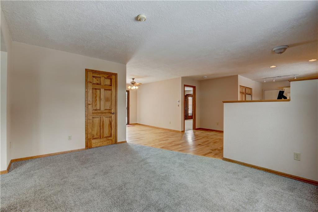 371 Alpine Road Dillon, CO 80435 - Photo 9 of 34 a view of an empty room and a kitchen