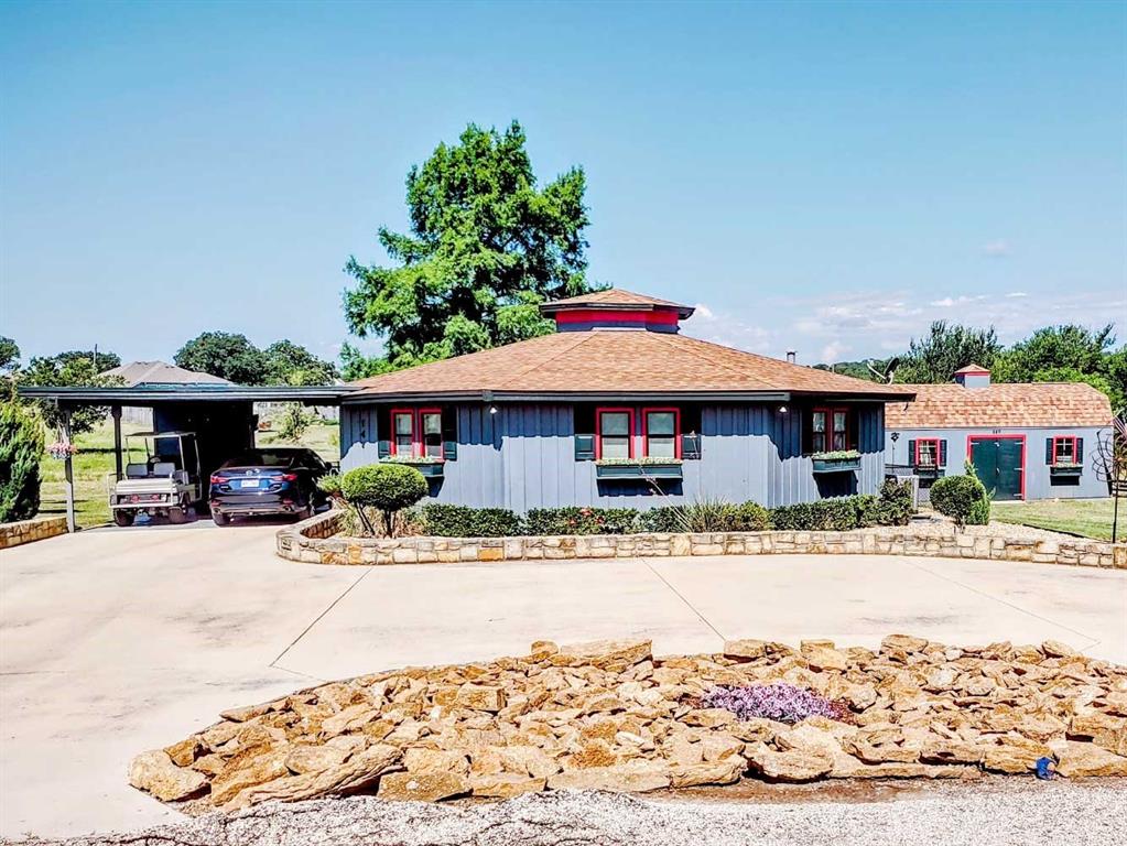 a front view of a house with a patio