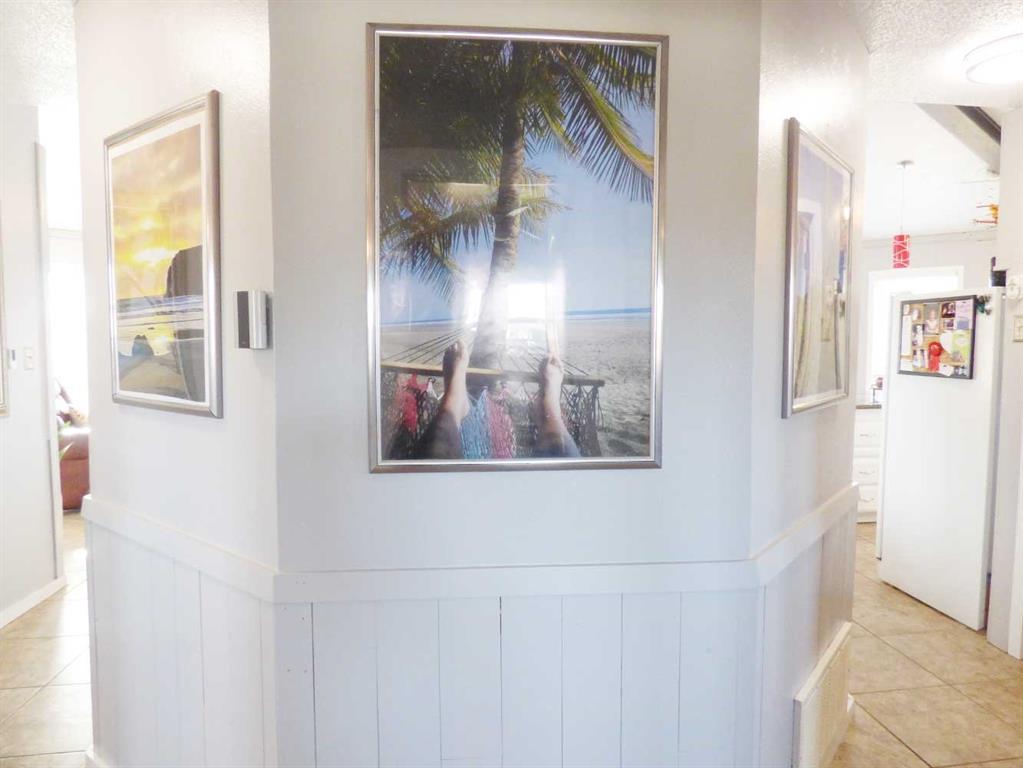 149 Bay Roc Lane Runaway Bay, TX 76426 - Photo 15 of 35 a view of a hallway with paintings on the wall
