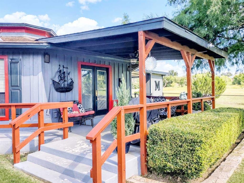 149 Bay Roc Lane Runaway Bay, TX 76426 - Photo 23 of 35 a view of an outdoor sitting area