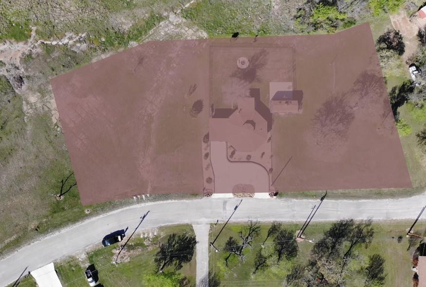 149 Bay Roc Lane Runaway Bay, TX 76426 - Photo 34 of 35 an aerial view of a house with a yard