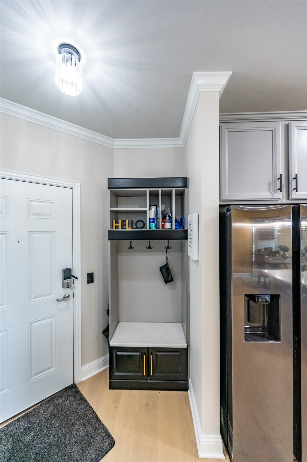 651 Watters Road, Unit 8201 Allen, TX 75013 - Photo 16 of 28 a living room with stainless steel appliances furniture a rug and a window
