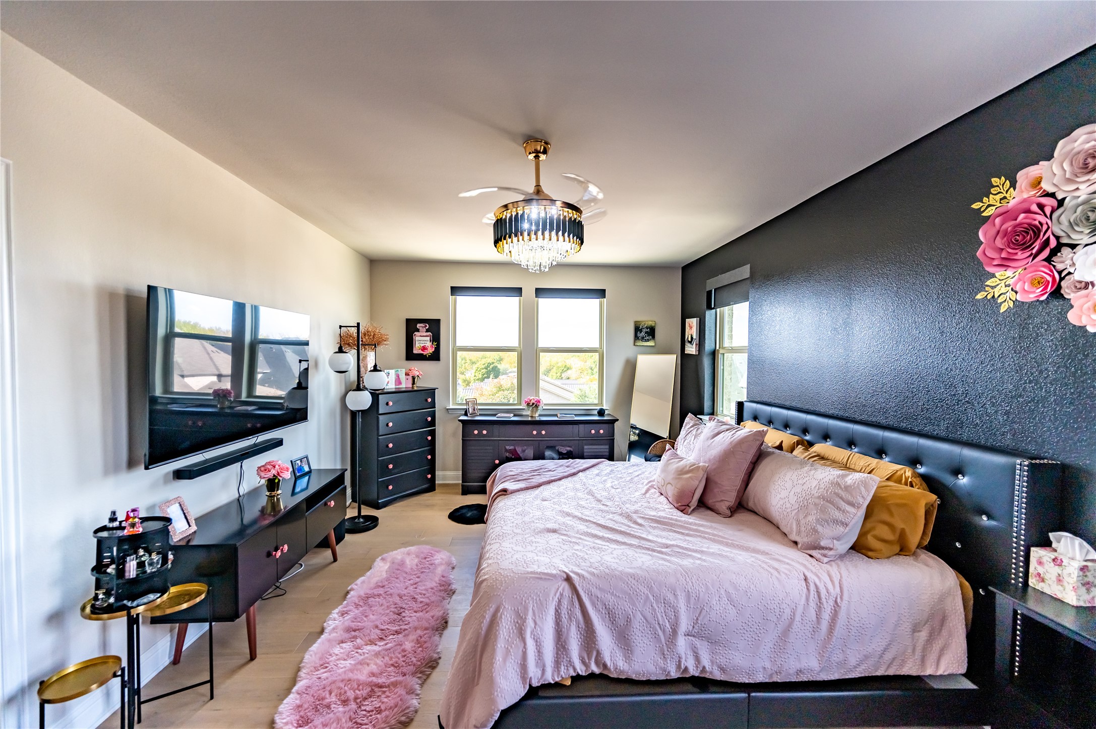 651 Watters Road, Unit 8201 Allen, TX 75013 - Photo 19 of 28 a bedroom with a bed window flat screen tv and a window