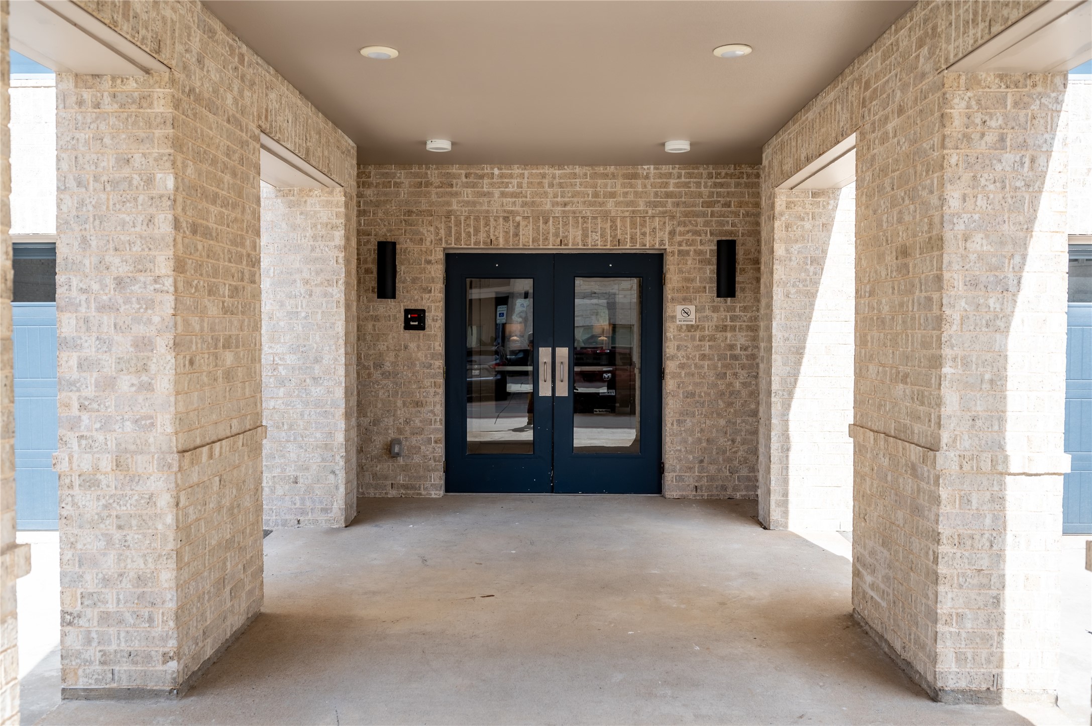 651 Watters Road, Unit 8201 Allen, TX 75013 - Photo 26 of 28 a view of a hallway with wooden shelves