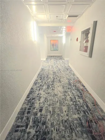 en empty room with windows