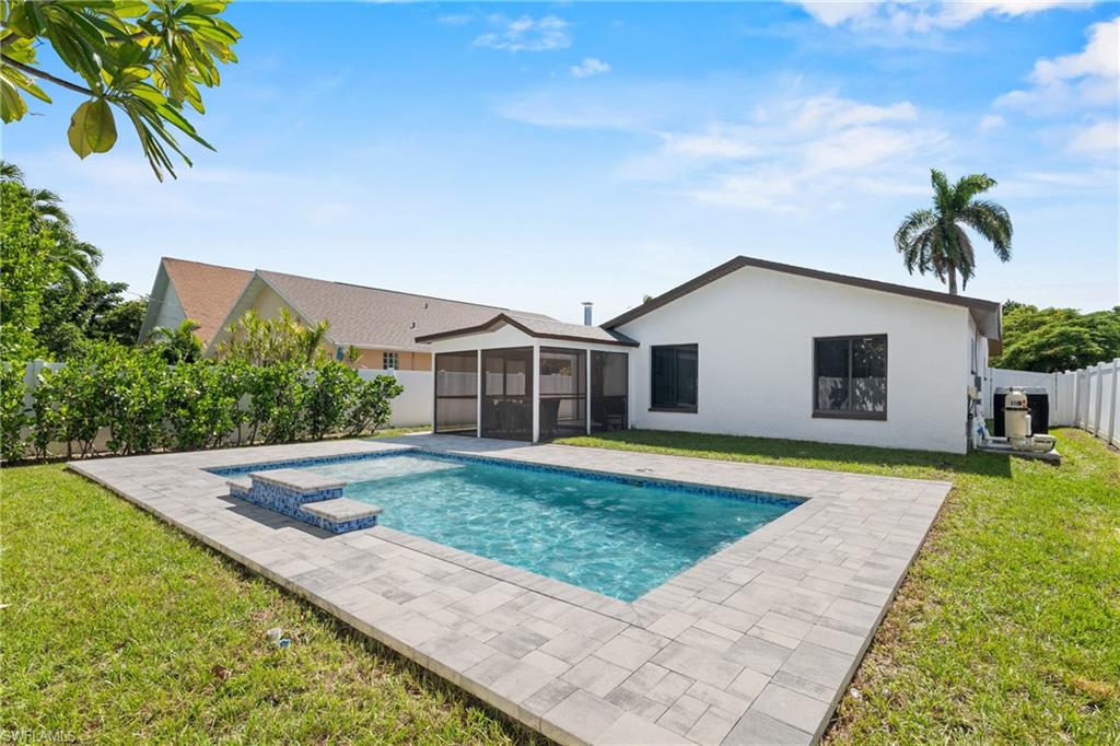 731 102nd Avenue North Naples, FL 34108 - Photo 18 of 23 a view of a house with a yard
